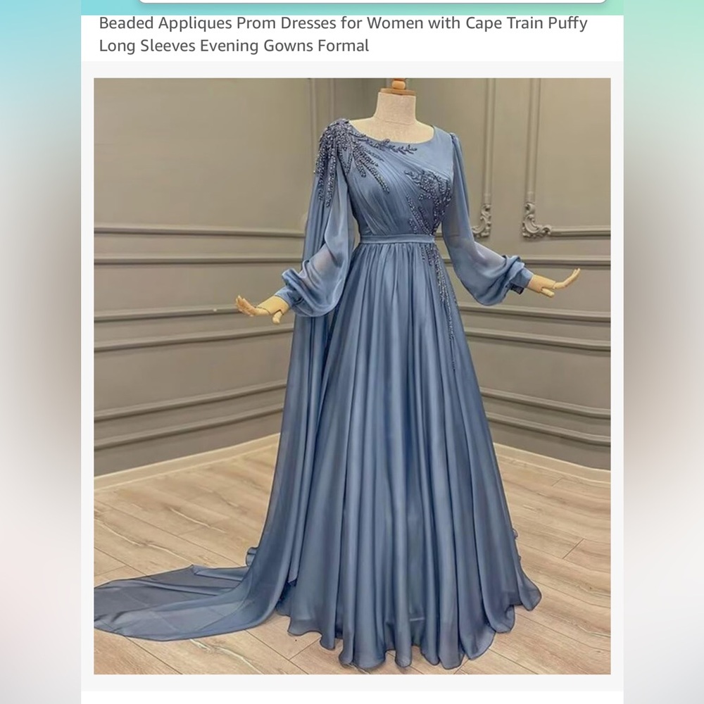 New with tags gorgeous dress with cape